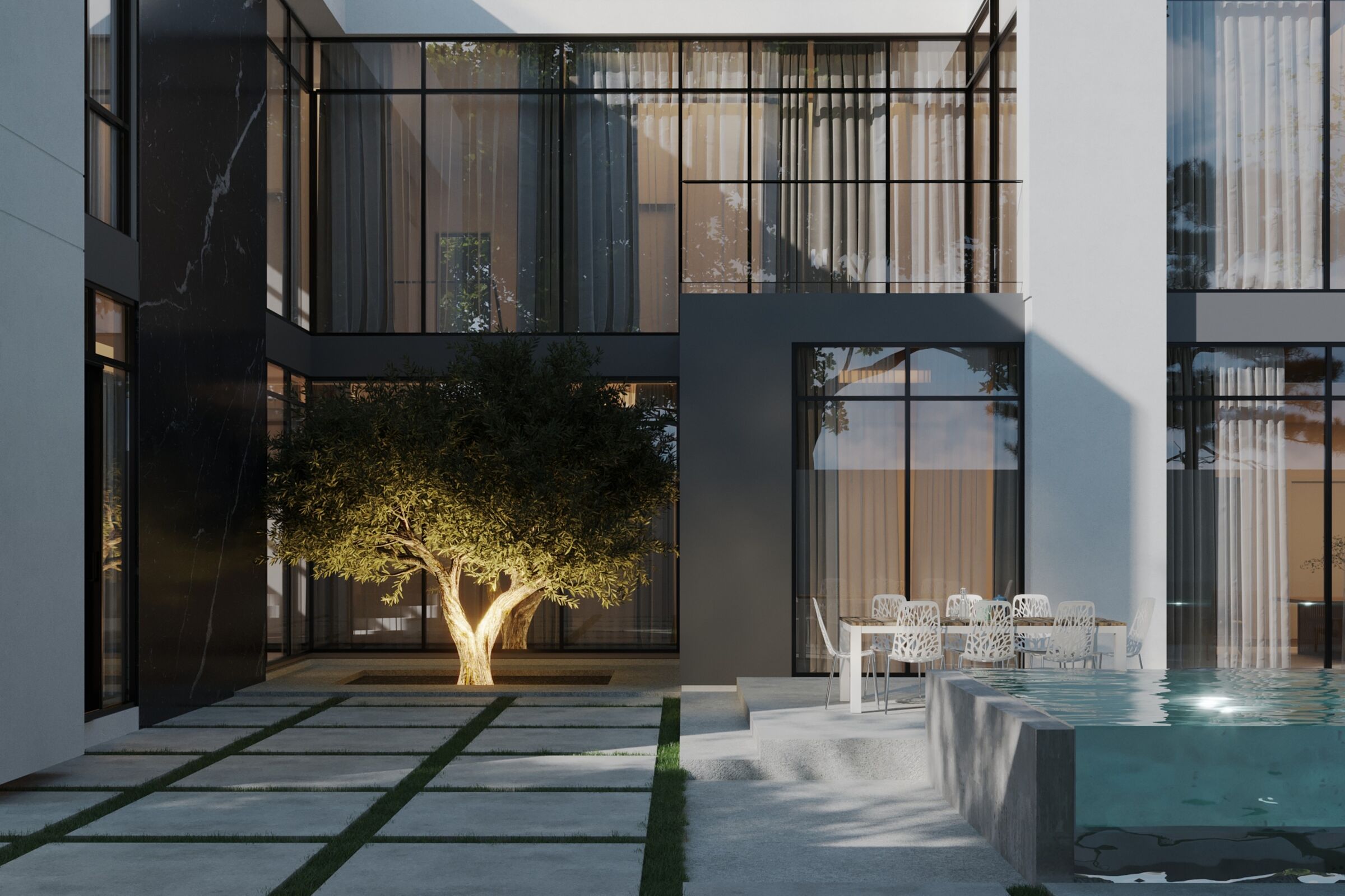Pool courtyard detail highlighting the double-height glazing and landscaped focal tree.