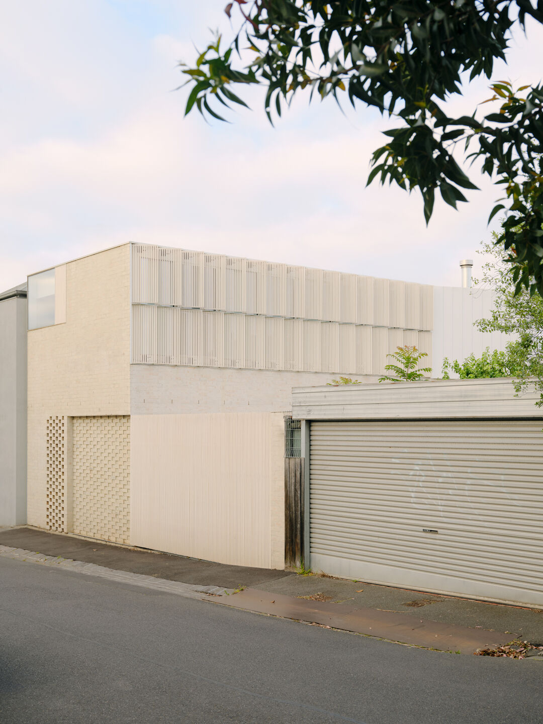 A view of the contemporary addition from the rear lane.