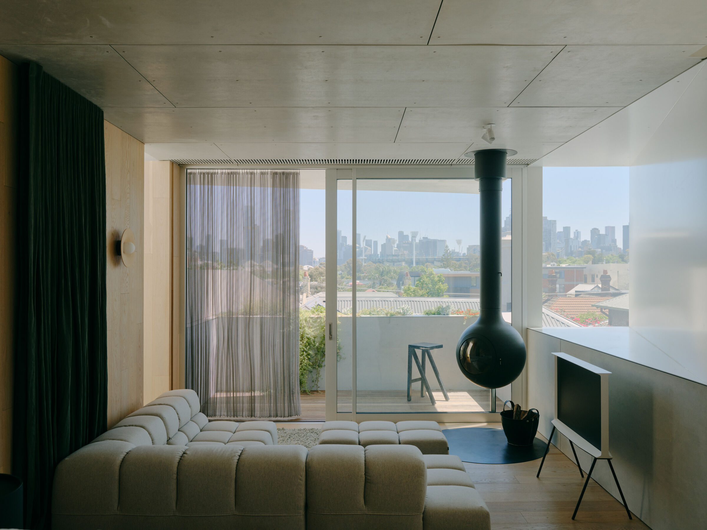 The upper level retreat with a view of the Melbourne skyline.