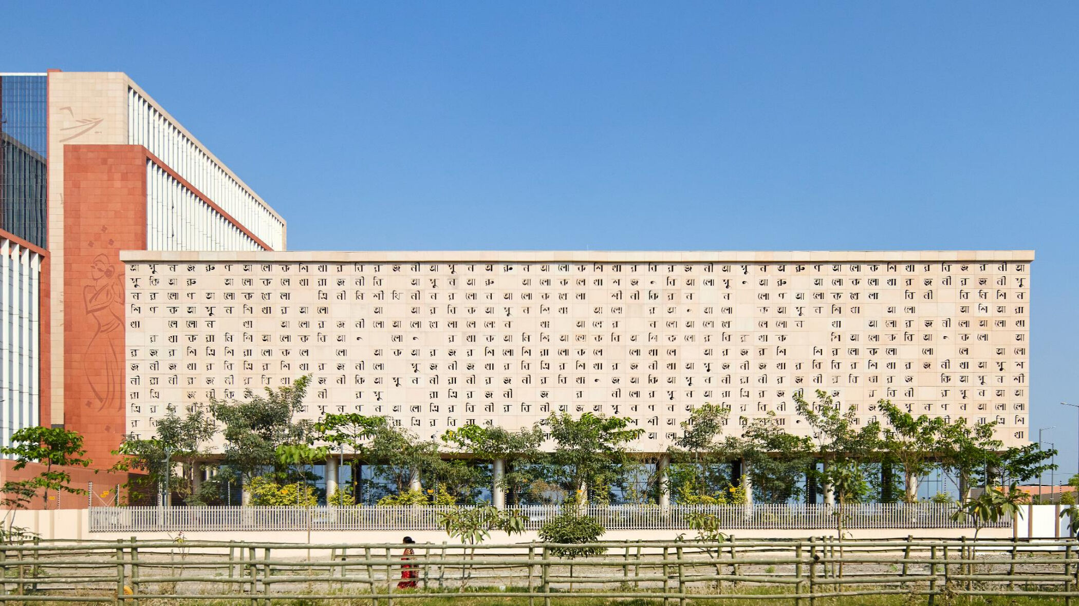 Bengali script compositions carved into sandstone on the knowledge centre facade