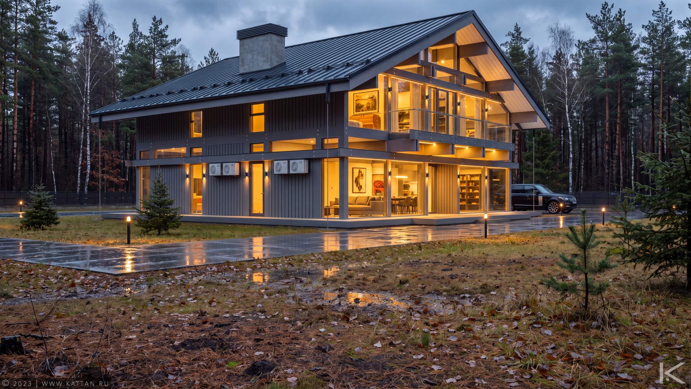 Graphite Residence — forest-facing elevation at dusk.