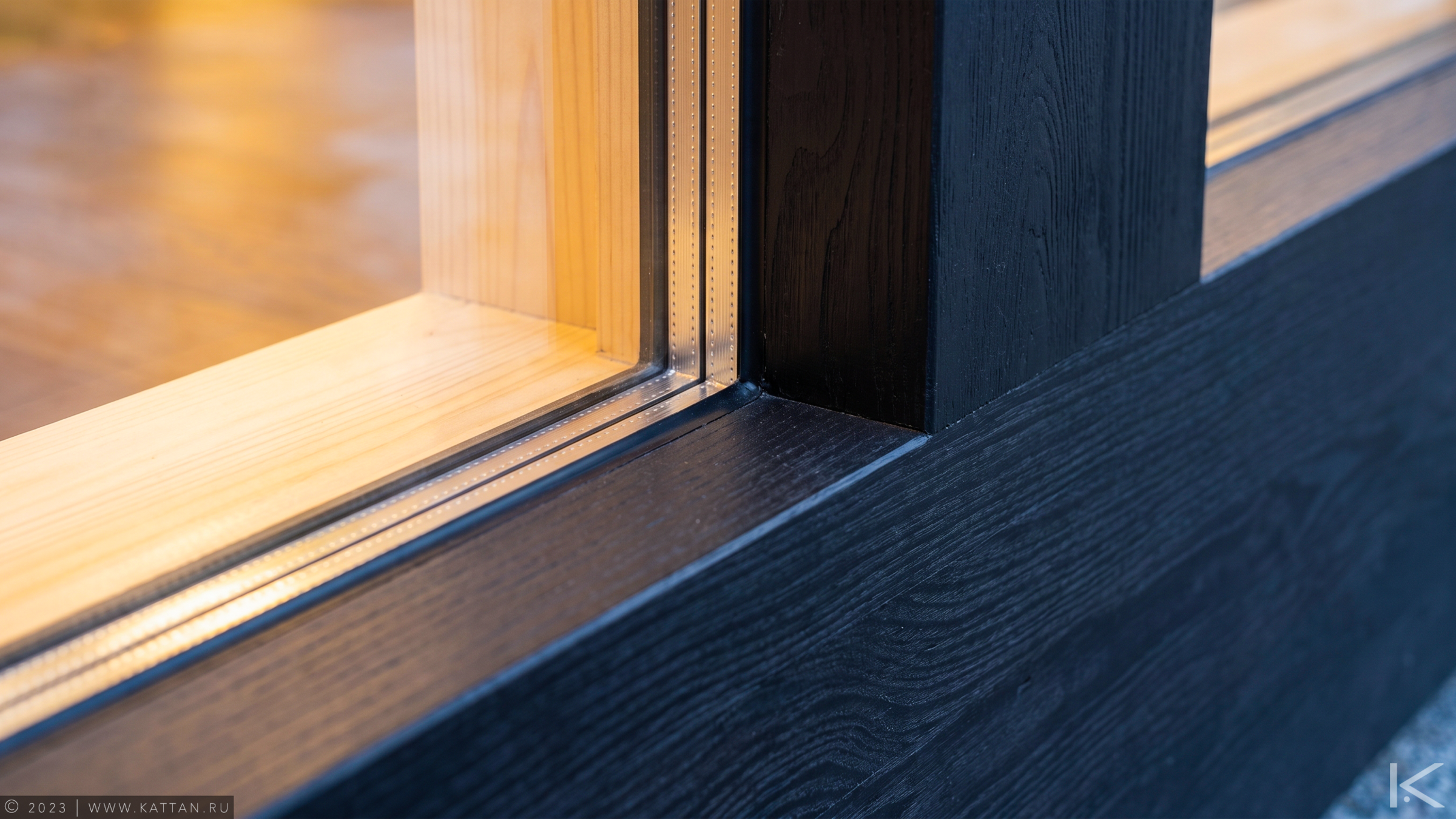 Graphite Residence — detail of panoramic glazing set within the timber frame.