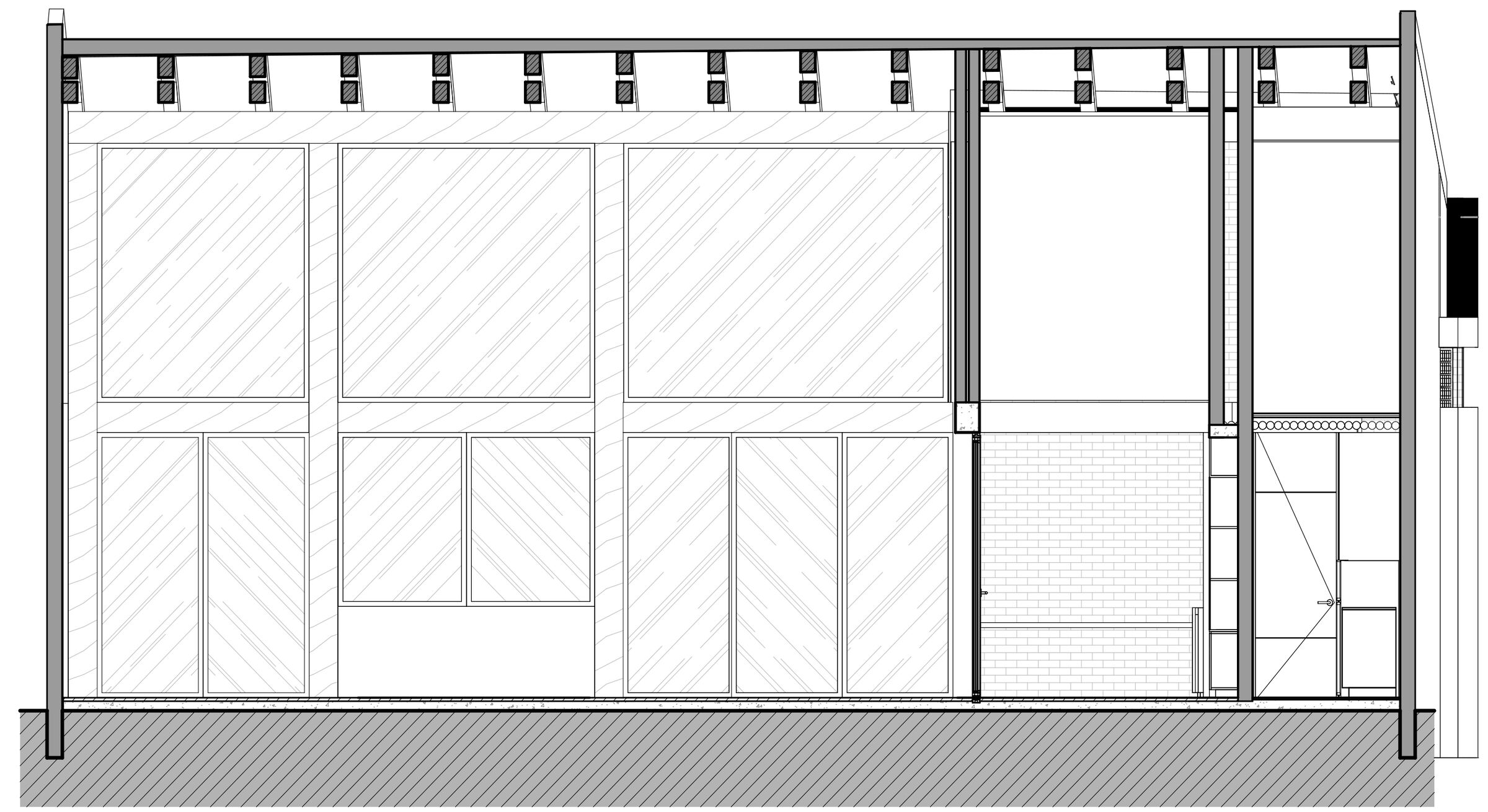Transverse section through the event hall, its glazed enclosures, and its vertical relationship with the roof.