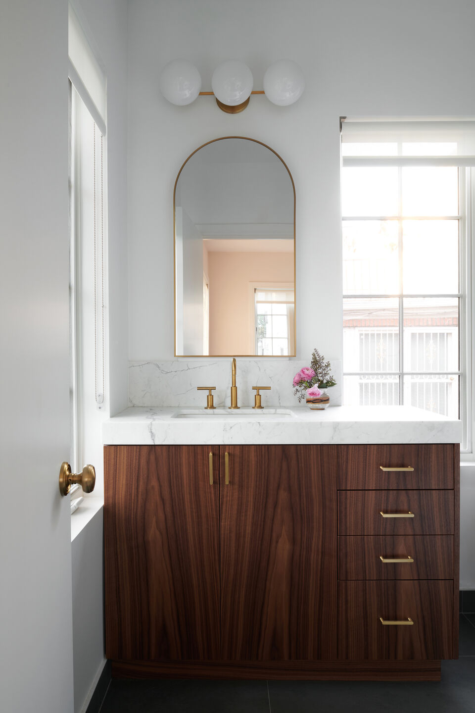 Walnut vanity with marble vanity top
