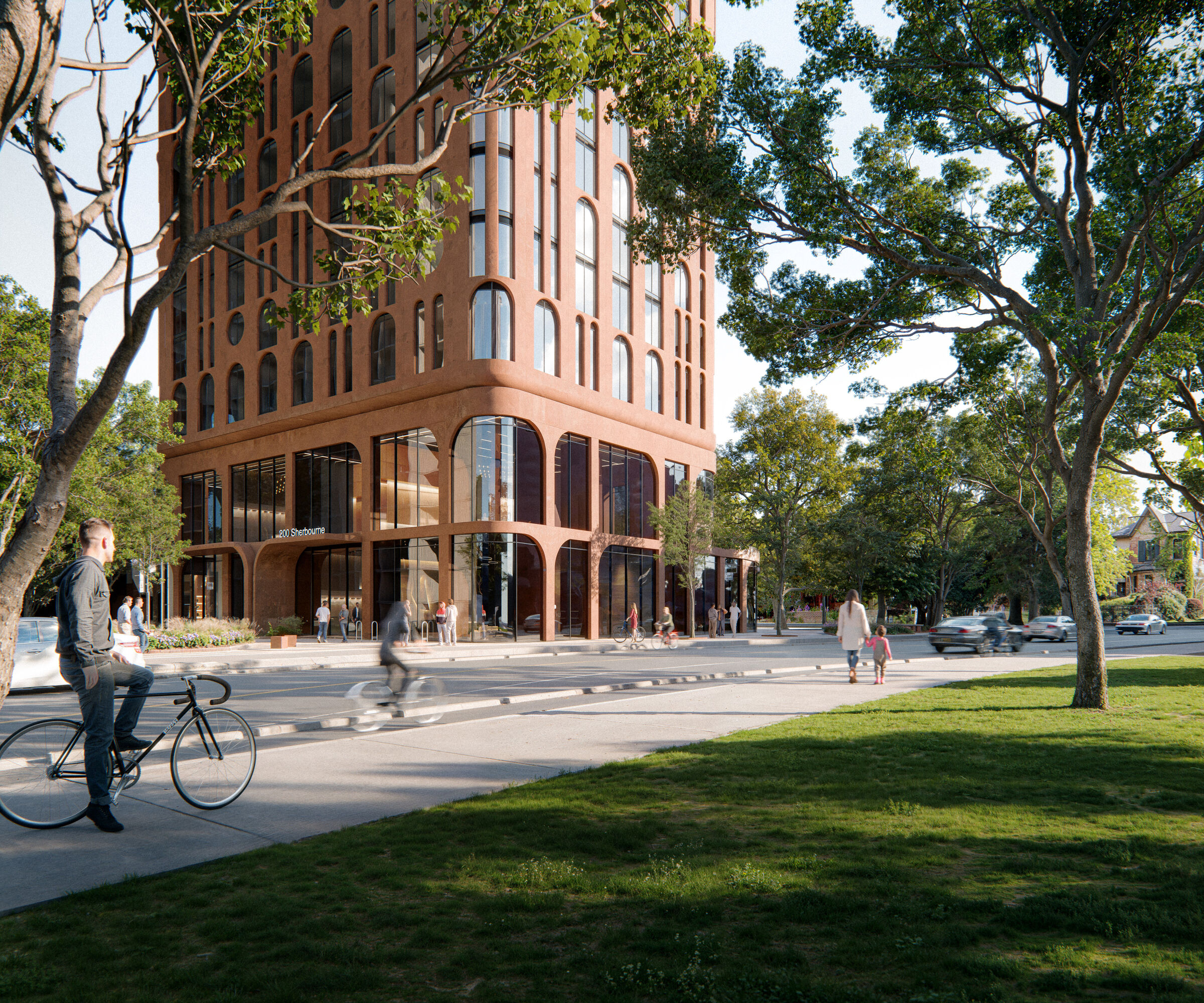 The south podium of Primrose Hill features sculpted precast arches and expansive glazing, activating the streetscape and connecting ground-floor public amenities directly to the surrounding urban fabric.