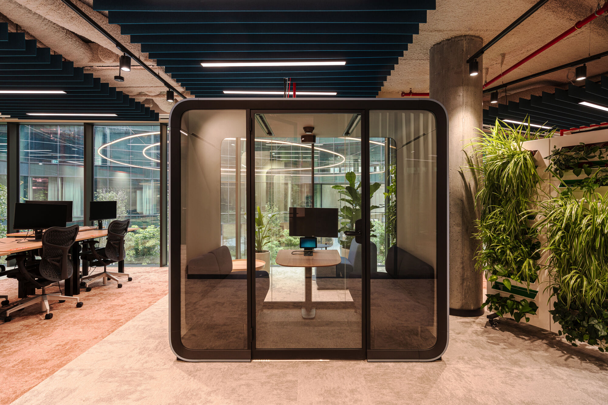 Acoustic pod in the workstation area