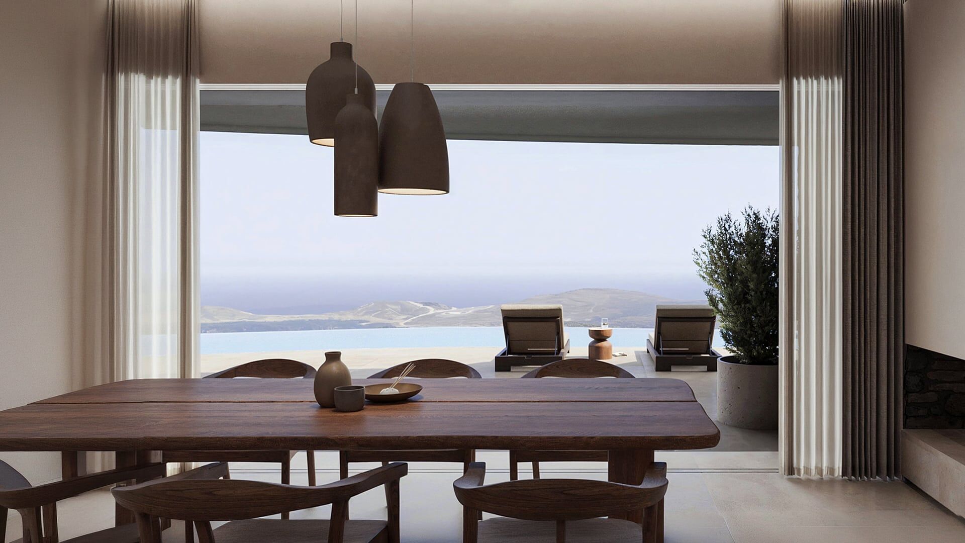 Dining area framing panoramic views across the Aegean.