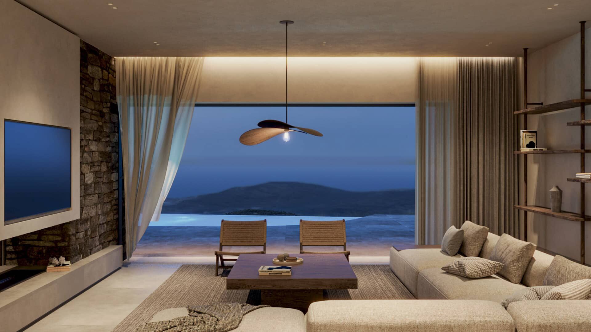 Living room oriented towards the sea through a full-height opening.