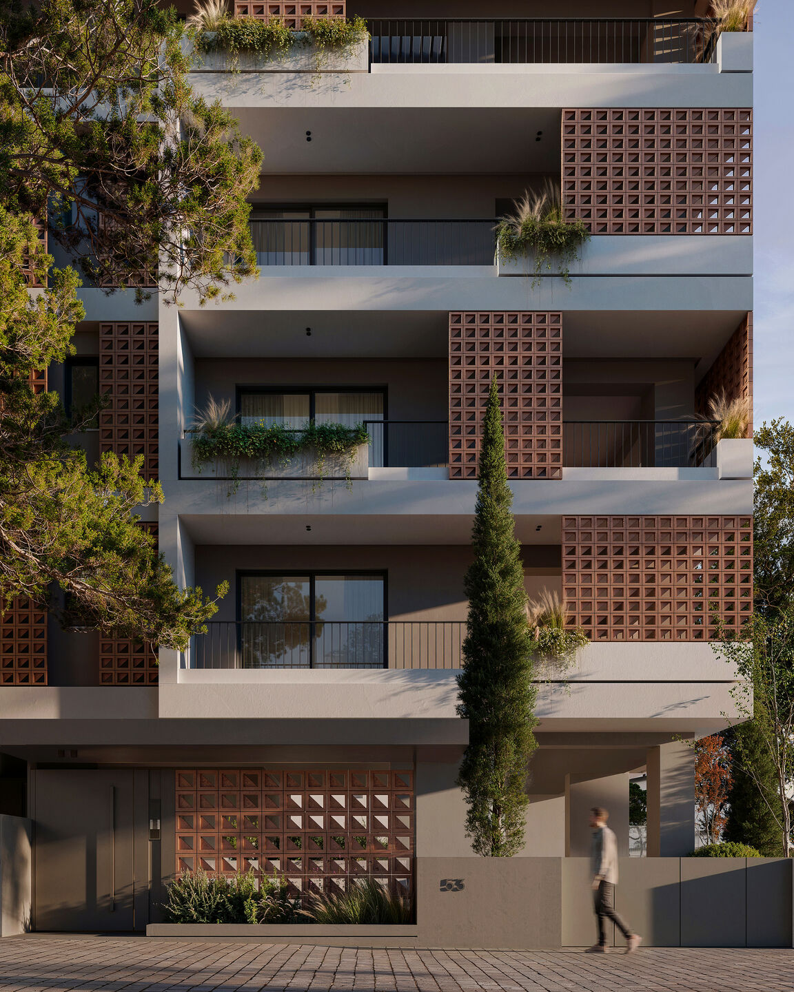 Façade detail highlighting the relationship between planting, balconies and filtered light.