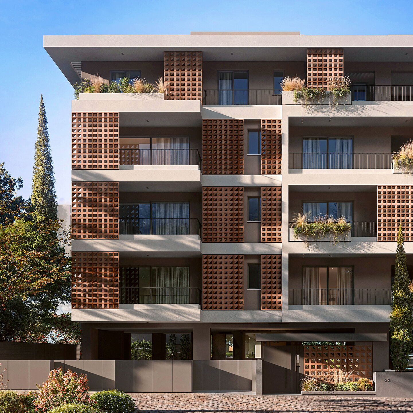 Front elevation with perforated ceramic screens providing privacy and solar shading.
