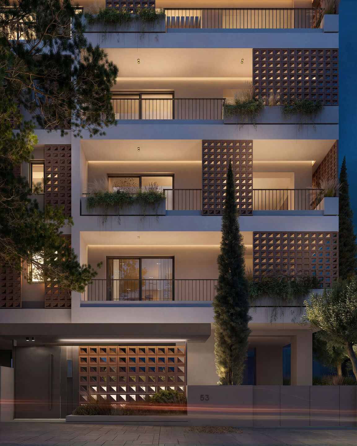 Dusk view emphasizing the depth of the balconies and the filtered façade composition.