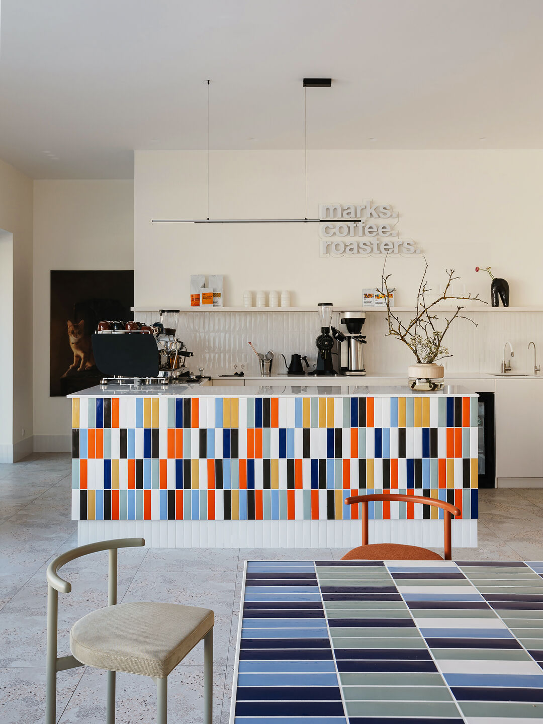 The coffee counter clad in colourful ceramic tiles by 41zero42.